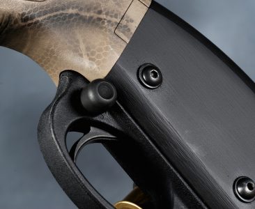 To NFA or not NFA? Nighthawk Custom 870 SBS 12 Ga.—Full Review The sample shotgun was fitted with an option Vang Comp "Big Speed Safety" for enhanced operation.