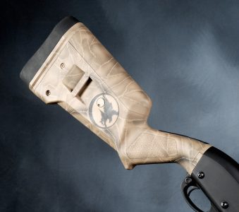 The sample shotgun was equipped with a Duracoat-finished Magpul SGA stock.