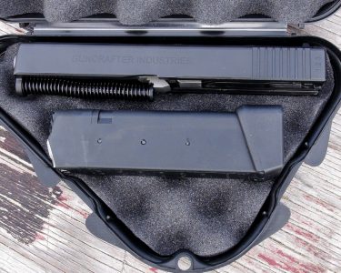 The conversion kit includes the full slide assembly and one nine-round magazine.