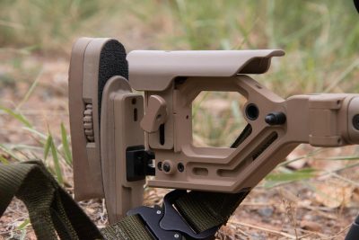The AX stock allows you to adjust the stock to fit you perfectly. Folded, it locks into place, cradling the bolt and allowing you to fit it into smaller packs and cases.