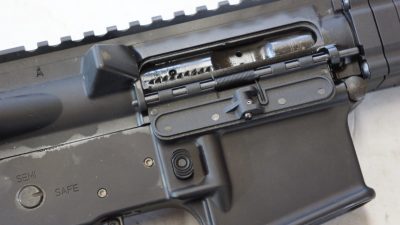 the dust cover on the rifle is an effective polymer unit that worked well for the author.