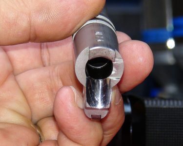 STI went with a ramped barrel for the Hex Tactical, and polished it to a mirror finish. There was nothing it wouldn't feed.