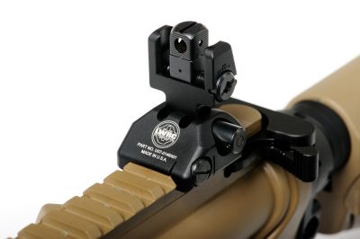 The Skirmish rear sight is a square post with four different aperture diameters that can be selected by rotating the post. 