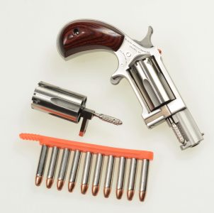 A 6.7-Ounce CCW Magnum? The Five-Shot Sidewinder—Full Review. The author tested the variant of the Sidewinder that comes with a .22 Magnum and a .22 LR cylinder system. Note the Tuff Products QuickStrip ammo carrier.