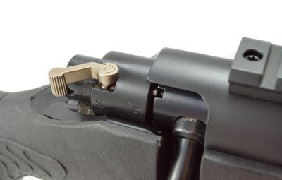 The three-position safety is easy to reach from a normal firing grip.