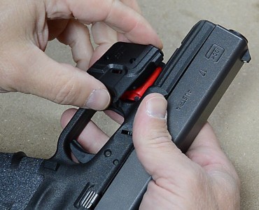 Crimson Trace – $129 Defender Series Laser for Glock/XD/LCP/S&W - Video Review by Justin Opinion