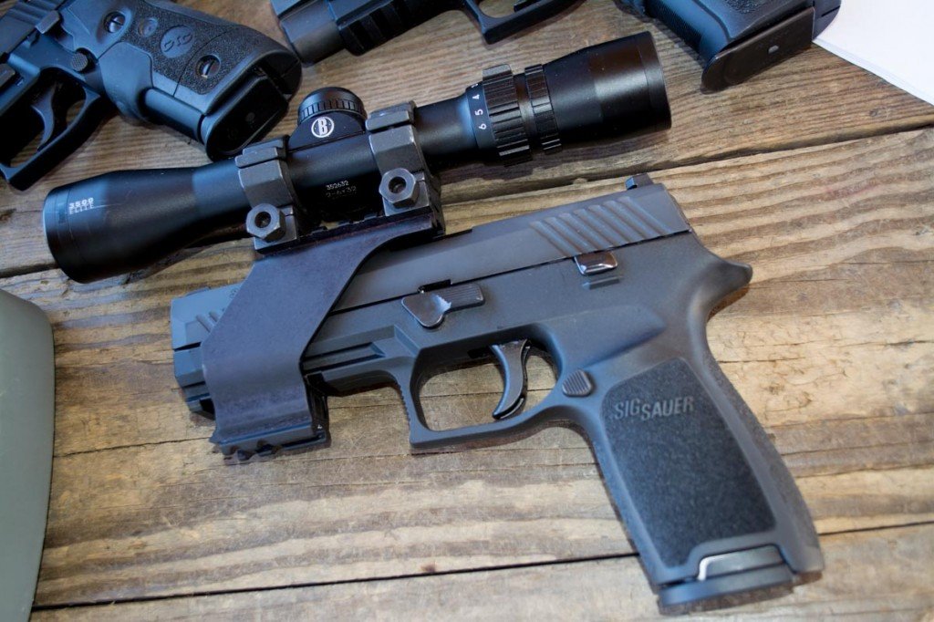 I used this UM Tactical optics mount and a Bushnell Elite 3500 Handgun scop...