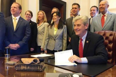 Mississippi Governor Signs Guns-In-Church Bill