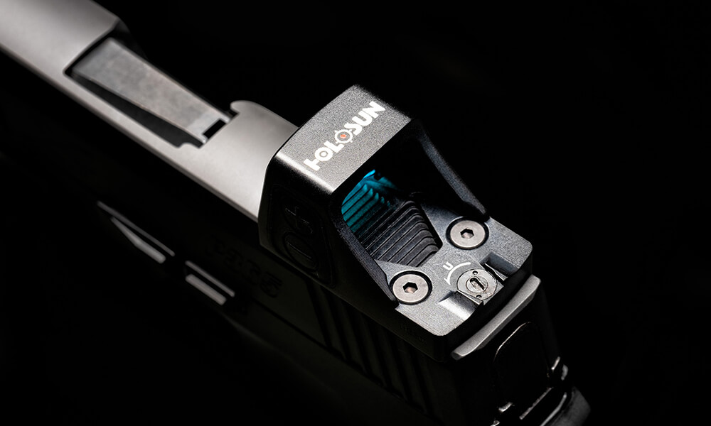 Trijicon Accuses Holosun of Patent Infringement Over RMR, SRO Trijicon Accuses Holosun of Patent Infringement Over RMR, SRO