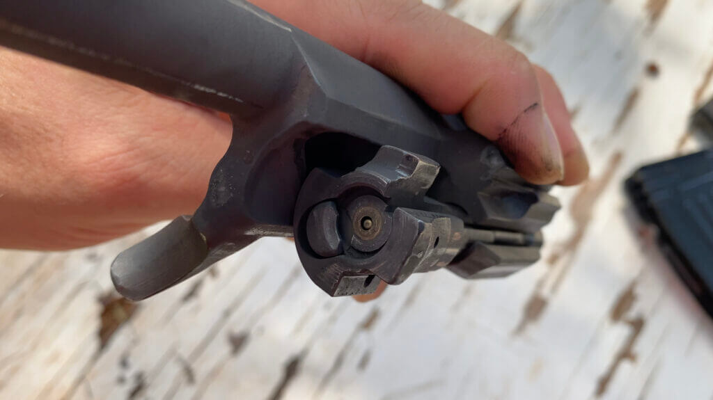 Inspecting the RAK-47 C-L for damage after various cycles of fire.