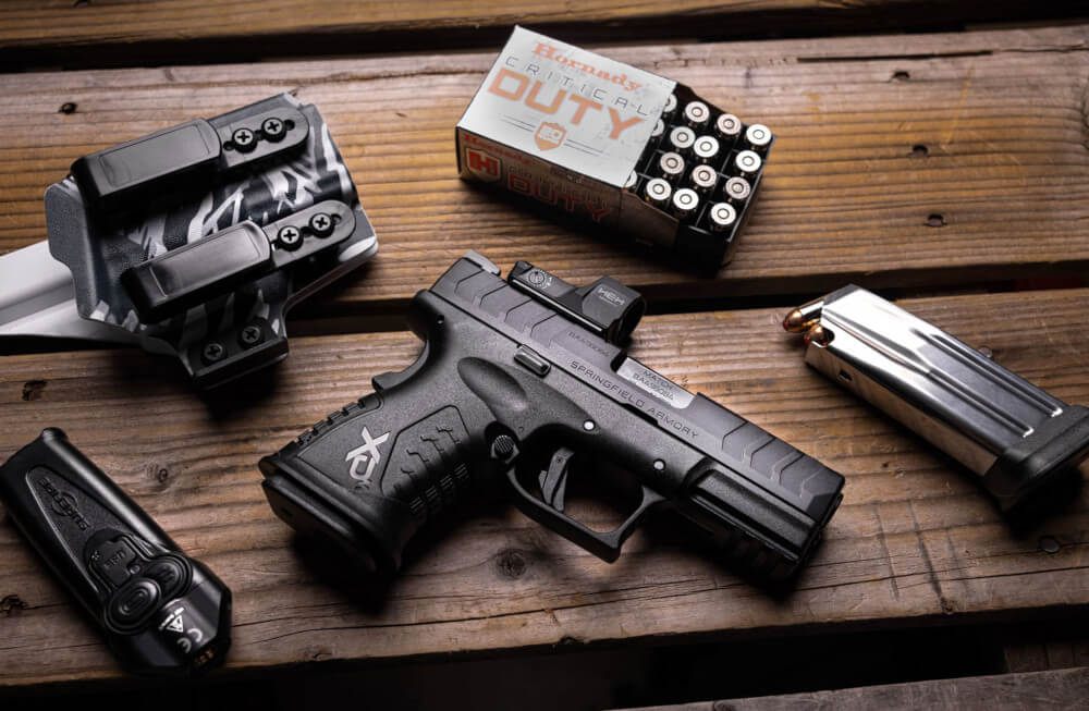 The New XD-M Elite 3.8 Compact OSP, Chambered for 10mm Auto Carries 11+1 or 15+1! The New XD-M Elite 3.8 Compact OSP, Chambered for 10mm Auto Carries 11+1 or 15+1!