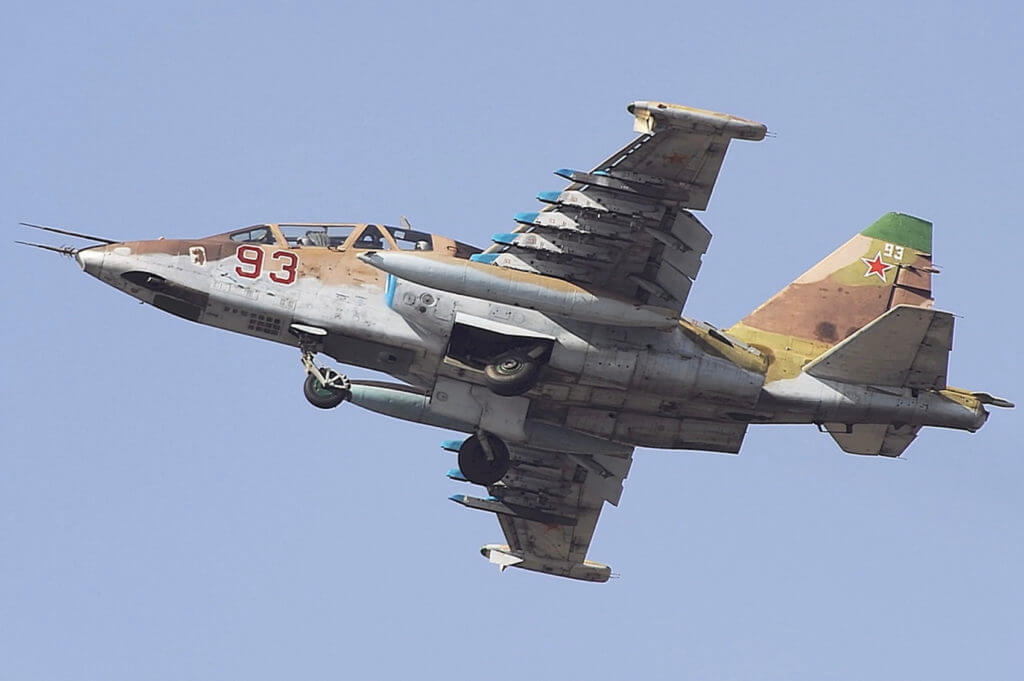 Su-25 flying against a blue sky