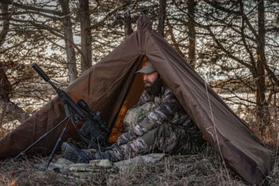 Two Vets Tripods nad Tracer Tactical Collab to make the The Tripod Tipi Tent. A tent that mounts up on a tripod