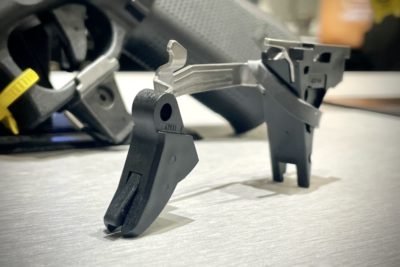 The Glock Performance Trigger set up at the Glock booth at SHOT Show 2023