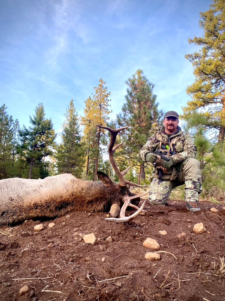 Author with his 5 point elk out in nature