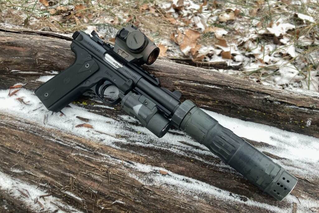 Ruger 22/45 Tactical with red dot, flashlight, and suppressor mounted. 