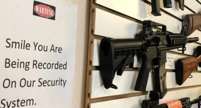 Sign in gun store.