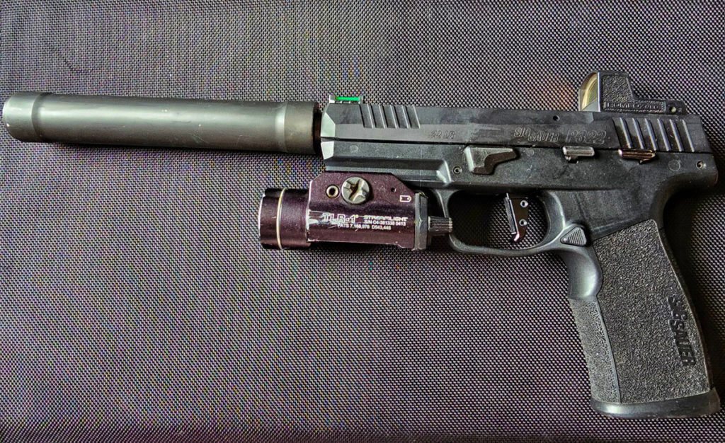 The SIG Sauer P322 with Romeo Zero Red Dot, Suppressor, TLR1 Light, and Suppressor