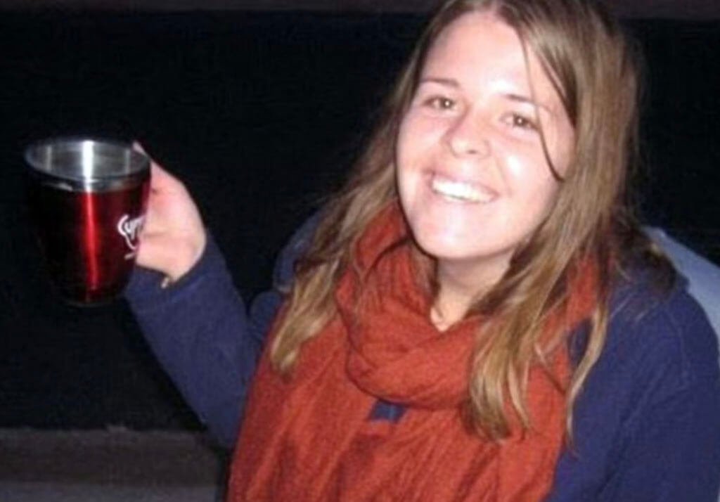 kayla mueller holding a mug