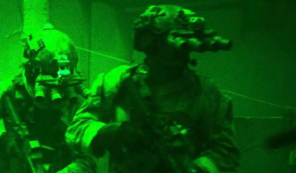 military guys with night vision helmets and rifles