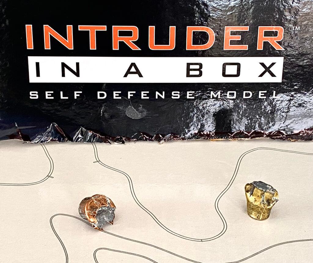 Two bullets shot through the Intruder In  a Box