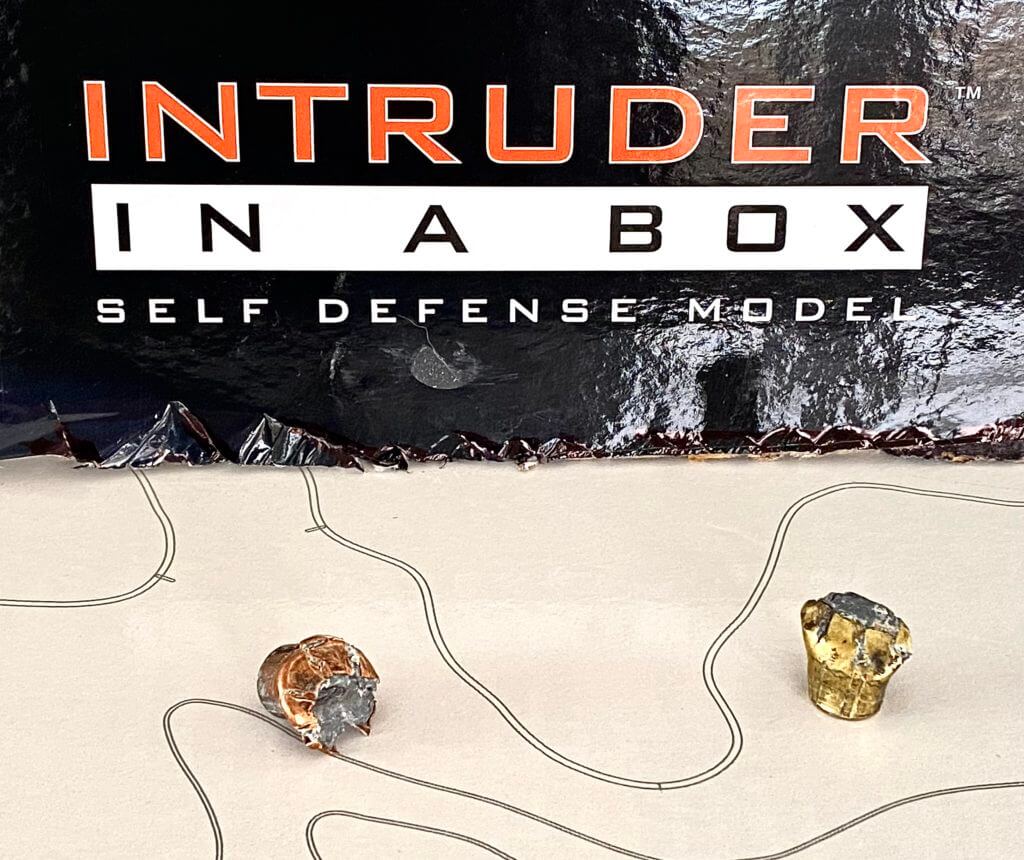 Intruder in a Box: A Better Way to Test Self-Defense Ammunition? Two bullets shot through the Intruder In a Box