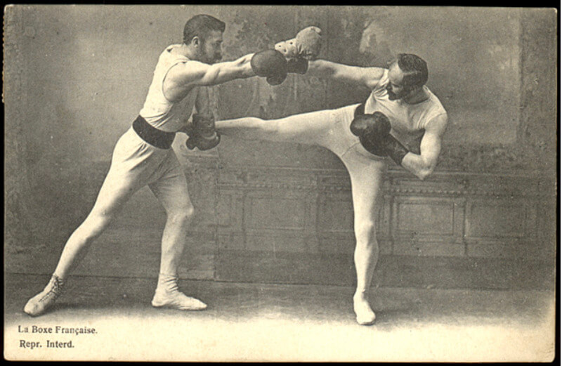 vintage photo of two men fighting savate style martial arts