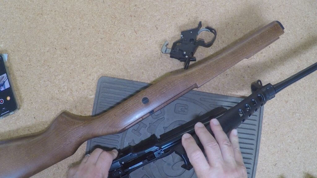 Remove the polymer handguard from the barrel on a Ruger Mini-14 Ranch Rifle