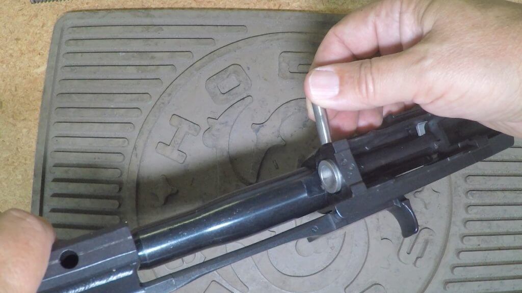 Removing recoil buffer cross pin on Ruger Mini-14 Ranch Rifle.