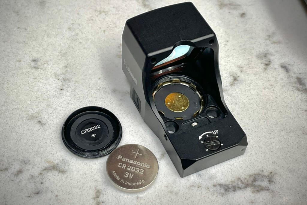 2 - Bushnell RXM-300 Reflex Sight Review The RXM-300's top loaded battery compartment