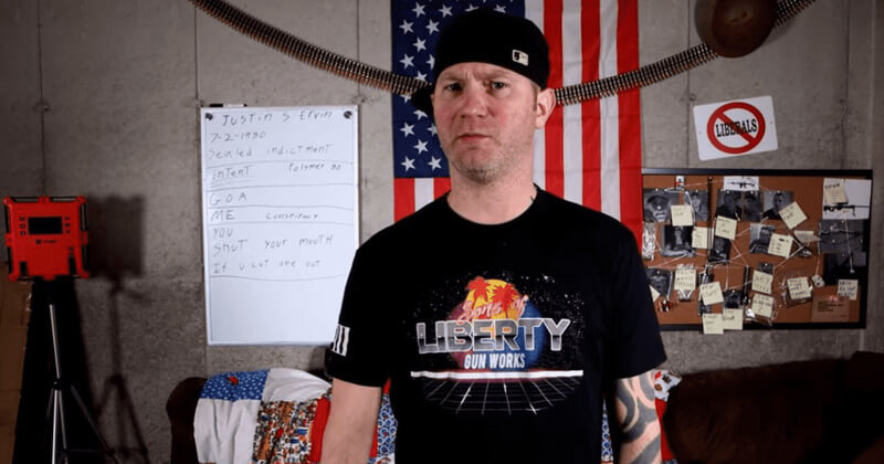 YouTuber Matthew Hoover in front of an American flag.