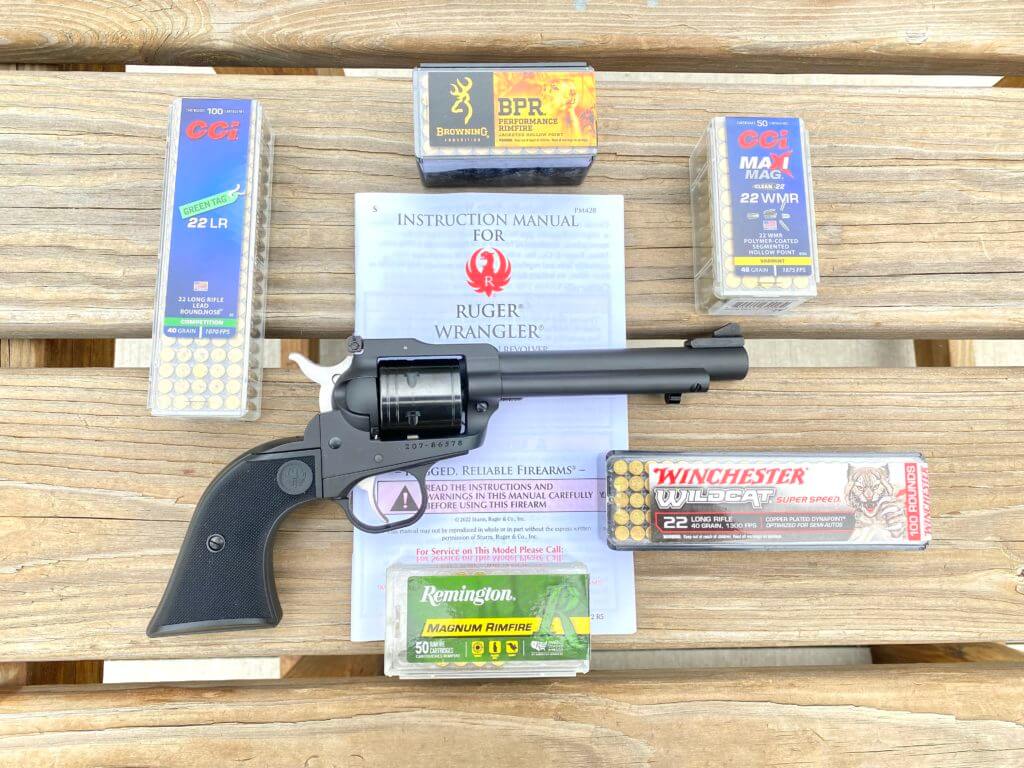 Gun sitting on bench with ammo