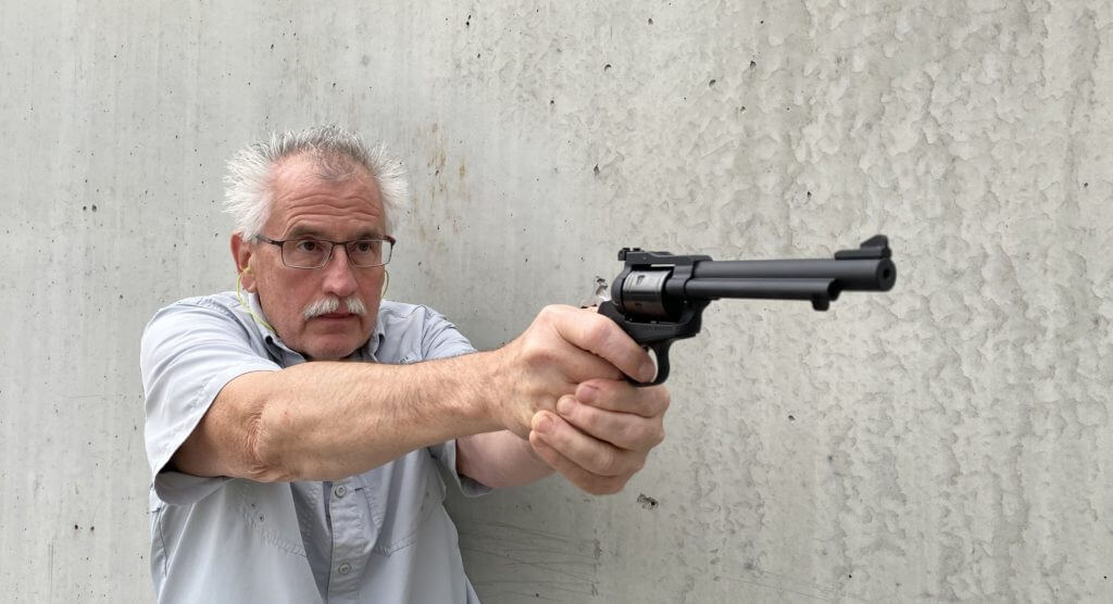 Man shooting Super Wrangler revolver