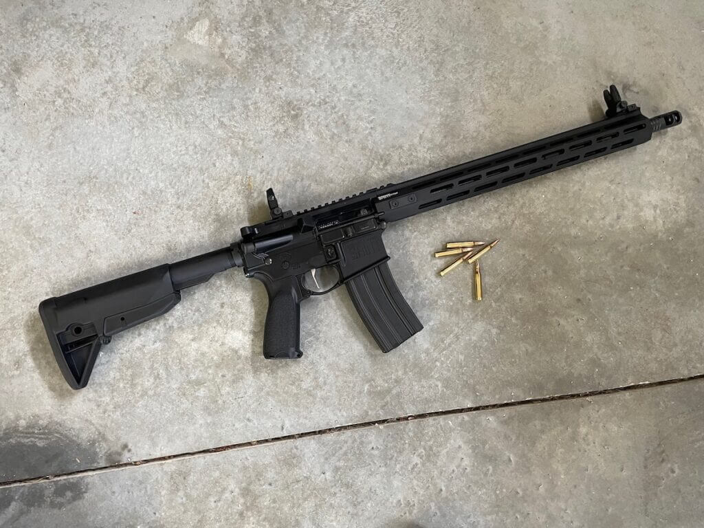 Springfield Armory Saint AR15 with ammo.