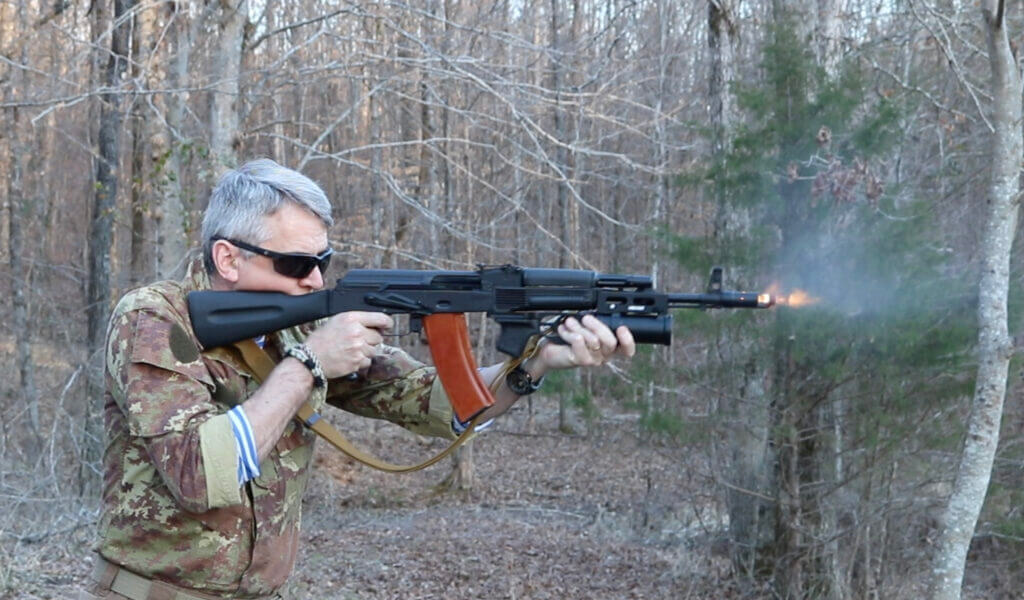 man shooting The 5.45x39mm AK-74