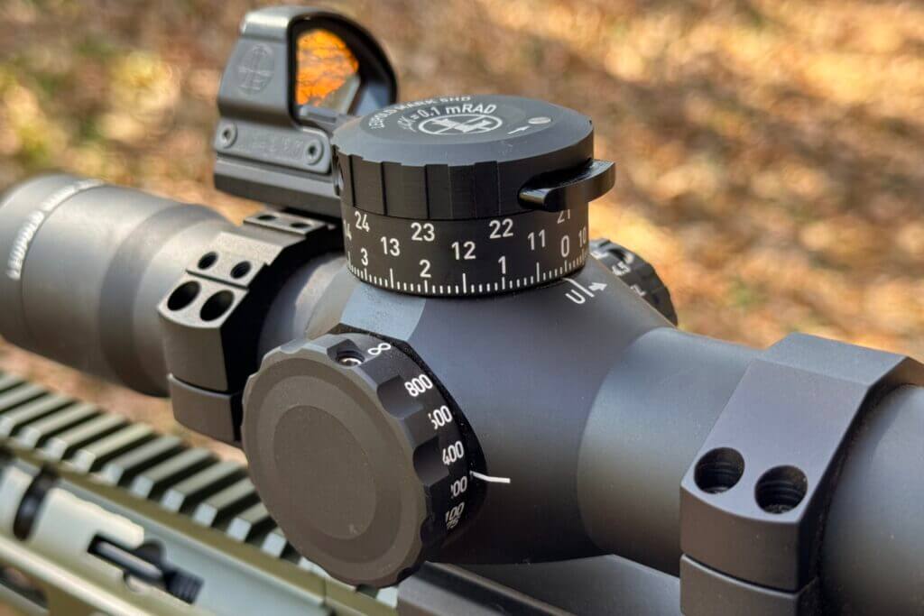 3 - Review: Testing the Leupold Mark 5HD 2-10x30 FFP Rifle Scope Push button for unlocking the turret sitting top center of the elevation cap