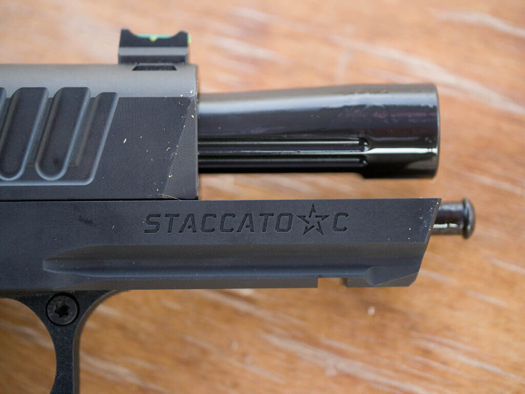 The slide is back and the front of the bull barrel is reveled, tapering from thick at the front to thinner at the rear. "Staccato C" is engraved on the frame under the barrel.