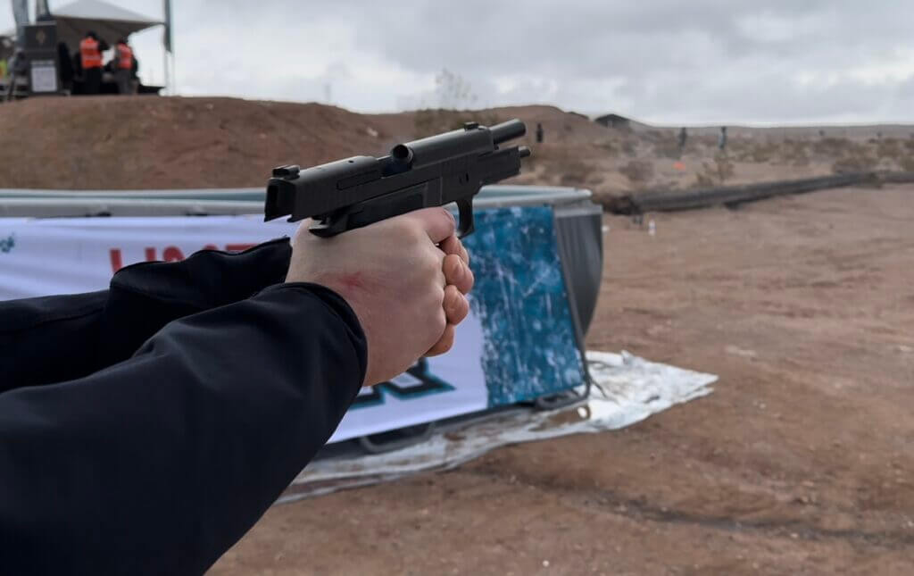 shooting a handgun at the range.