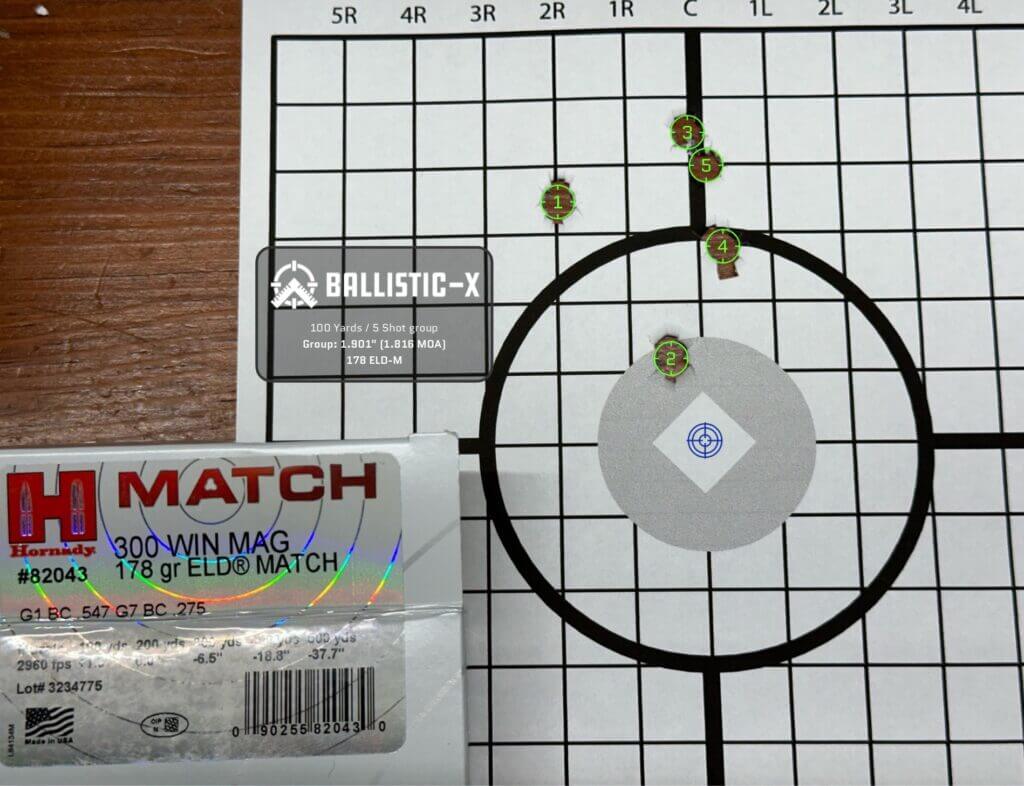 A 5-round group shows this rifle's accuracy.