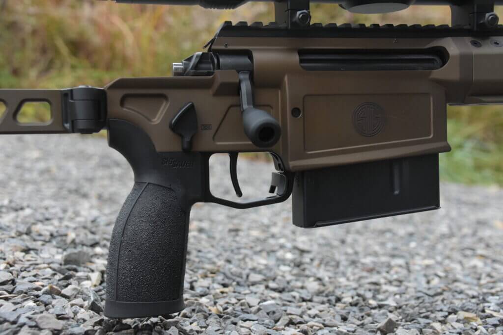 Closeup view of a rifle receiver.