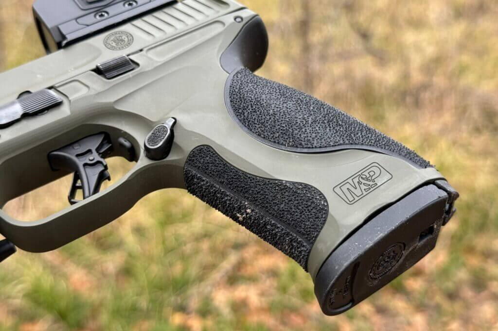 Smith and Wesson handgun with aggressively textured grip pattern