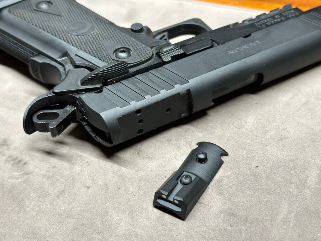 Disassembled view of the cover plate on a Girsan Witness2311