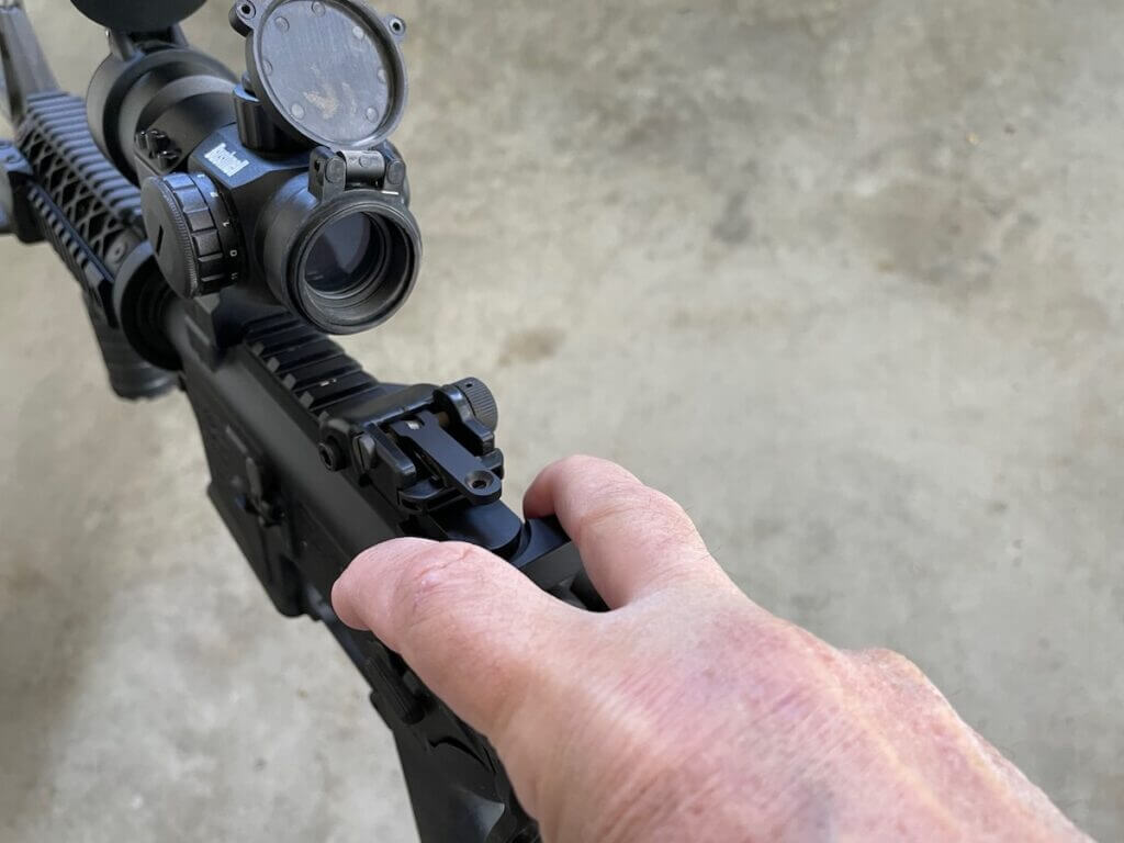 red dot optic a mil-spec charging handle and two-finger grasp