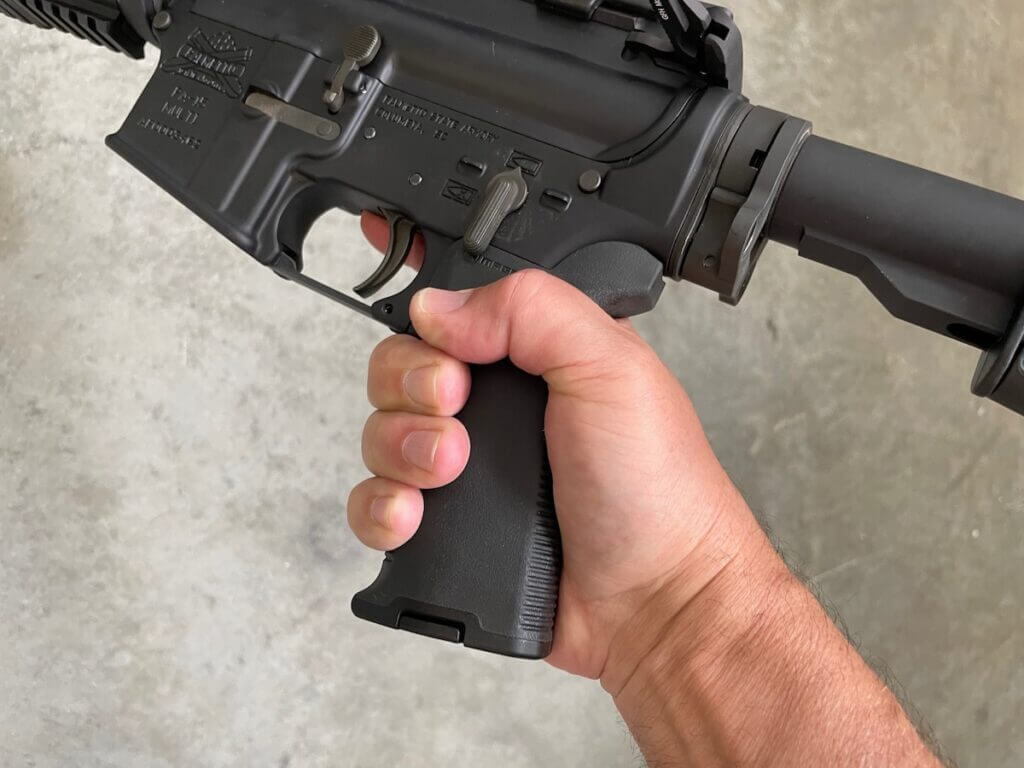 man holding AR15