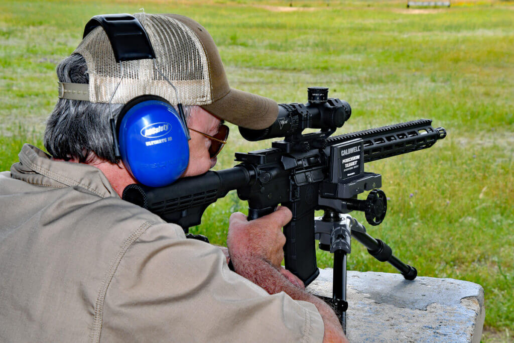 Author shooting M&P 15 Sport II with Caldwell Precision Turret rest.
