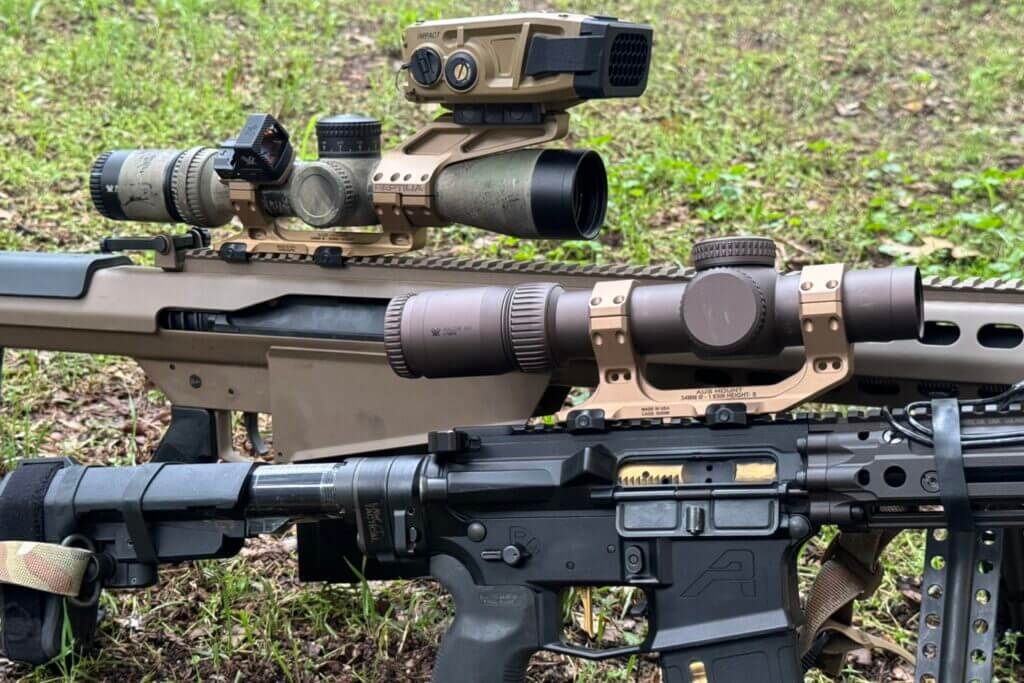 AUS Mount on rifle in grass