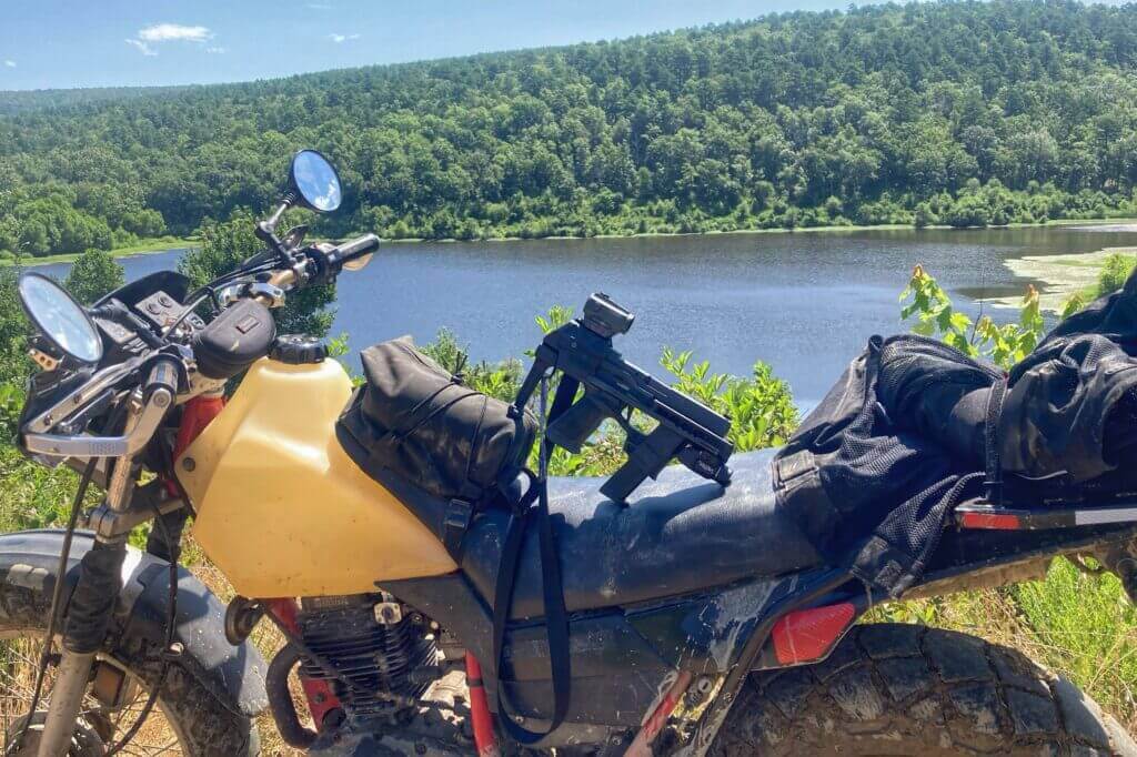Trail riding with the SIG Sauer P320 in PDW mode.