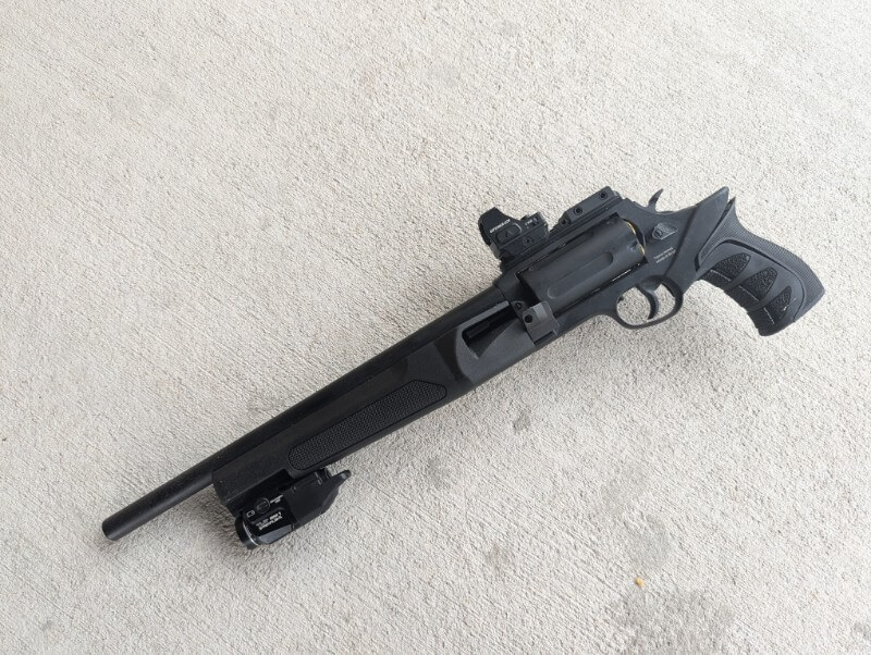 Taurus Judge Home Defender stretched .410 and .45 Colt revolver on concrete