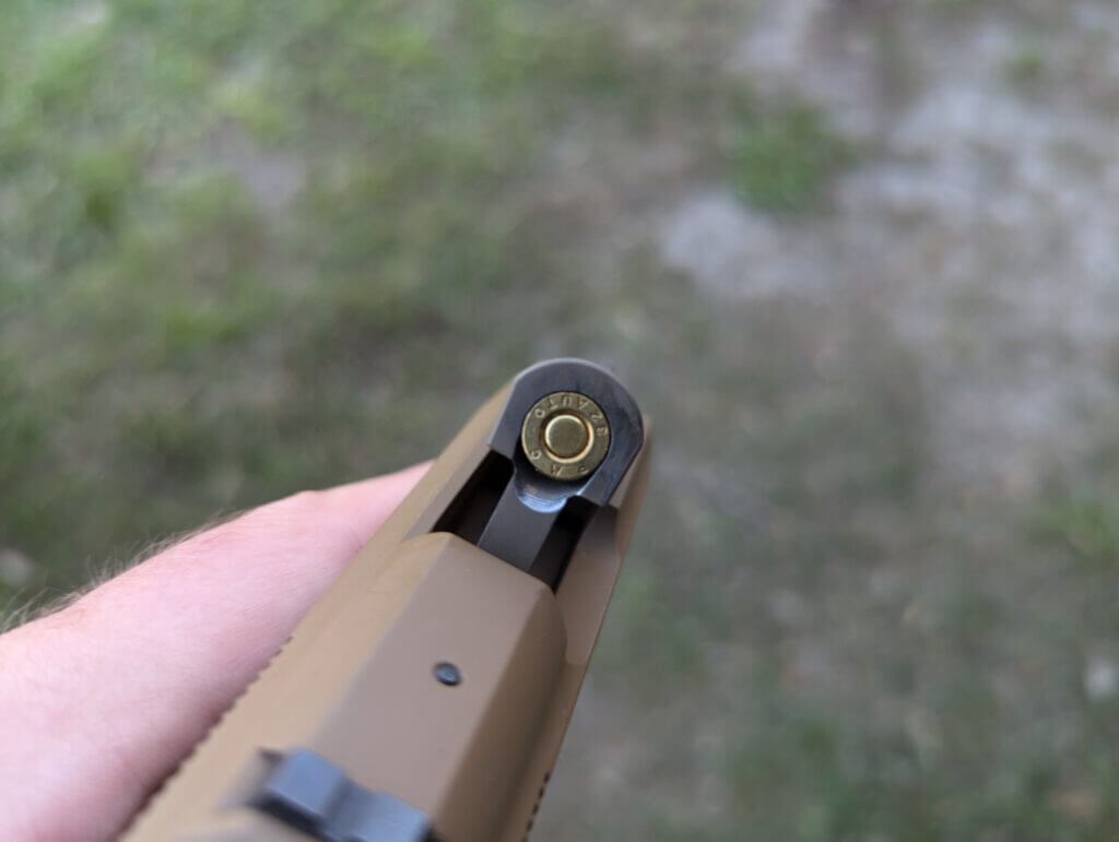 tip up barrel handgun with .32 acp round