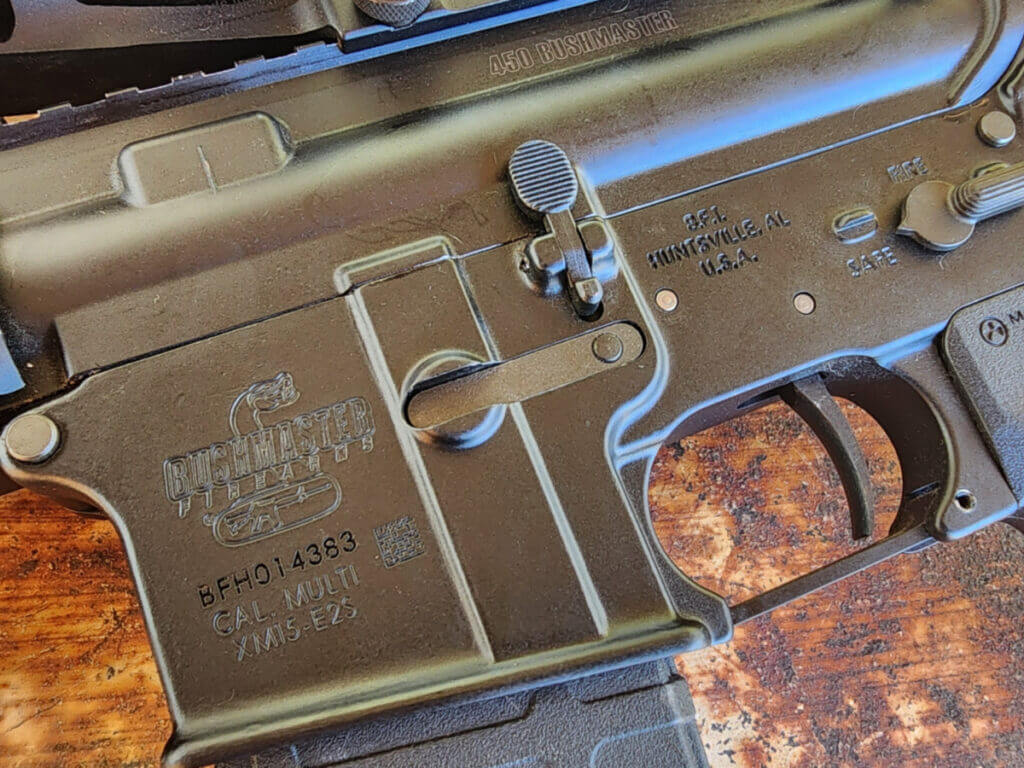 Close view of Bushmaster 450 BM SD receiver and AAC Square Drop handguard with full length Picatinny rail